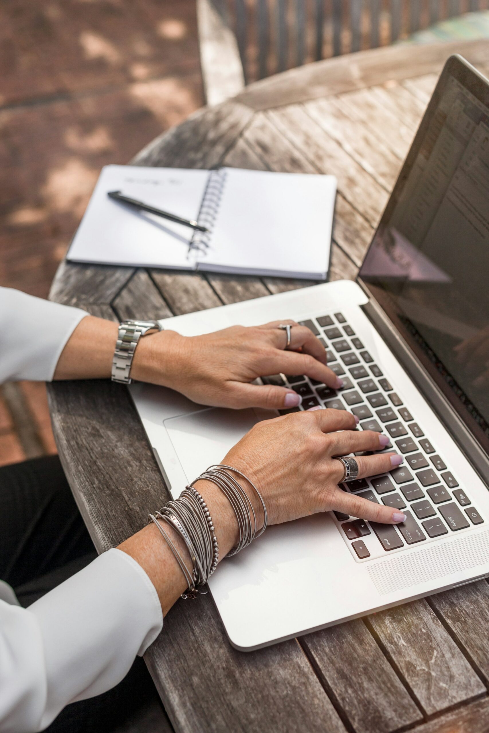 Person typing on macbook pro Photo by LinkedIn Sales Solutions on Unsplash